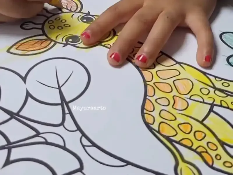 A child coloring a giraffe illustration using a yellow colored pencil.